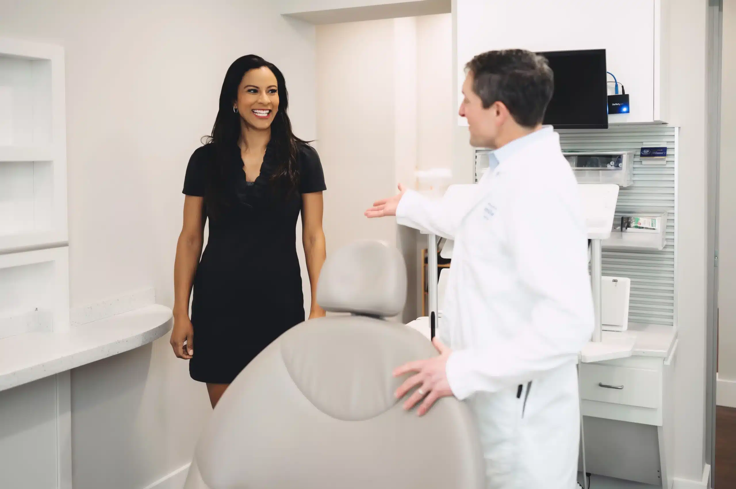 Dr. Worful welcoming a patient into the treatment room