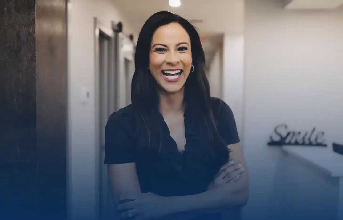 Smiling team member at the Alpharetta Smile Care front desk