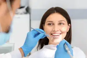 Woman smiling during a dental check-up