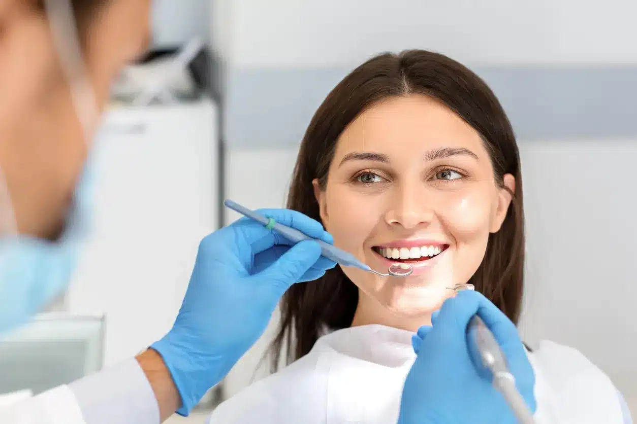 Woman smiling during a dental check-up