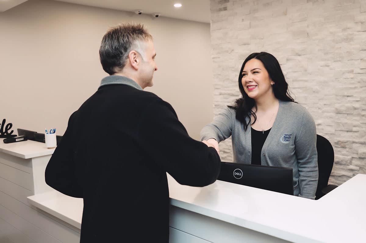 Patient greeted at the front desk